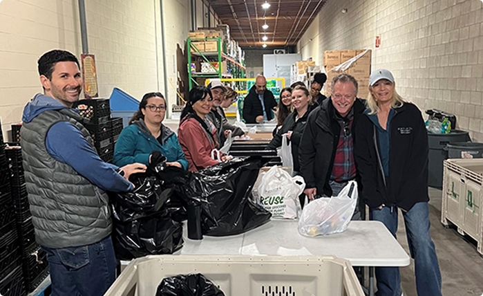 Volunteers packing donations at a community center.