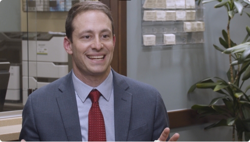 Video thumbnail showing physician assistant in a professional setting.